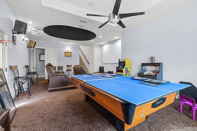 recreation room with carpet flooring and ceiling fan