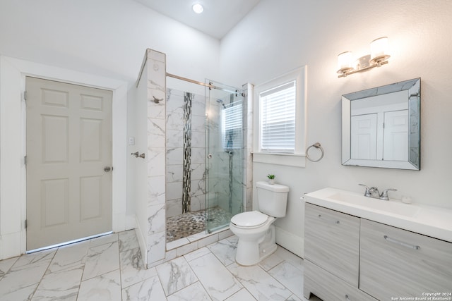 bathroom featuring vanity, toilet, and an enclosed shower