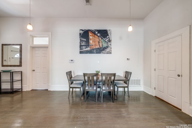 dining room featuring dark wood-type flooring