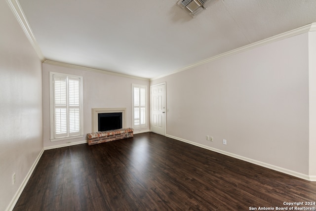 unfurnished living room featuring crown molding, a fireplace, and dark hardwood / wood-style flooring