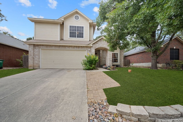 front facade with a garage and a front lawn