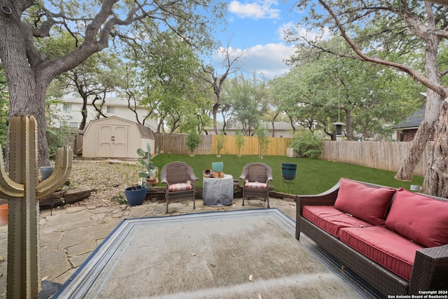 view of patio / terrace with a storage shed