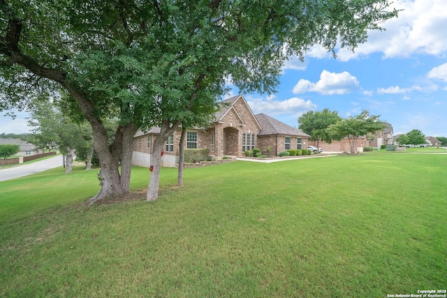 view of front of home with a front lawn