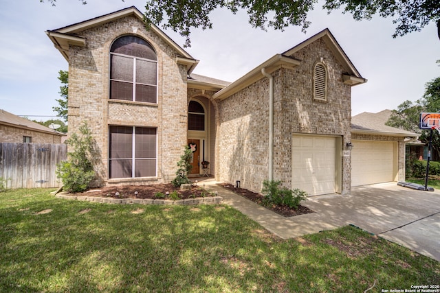 front facade featuring a front yard and a garage