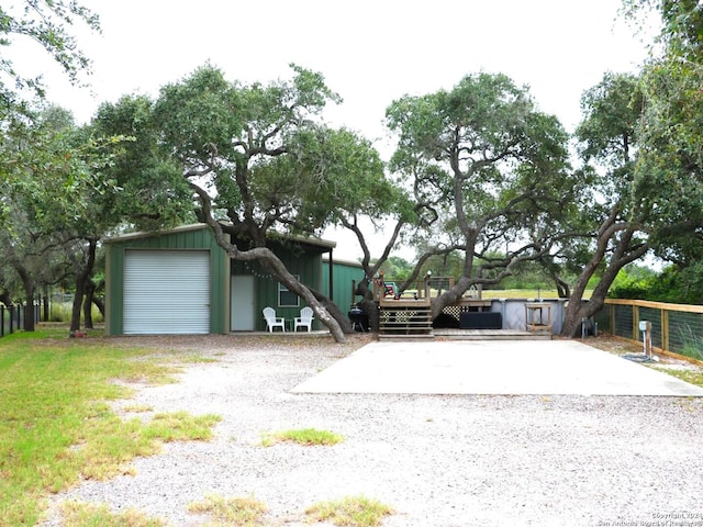 view of front facade featuring a front yard and a garage