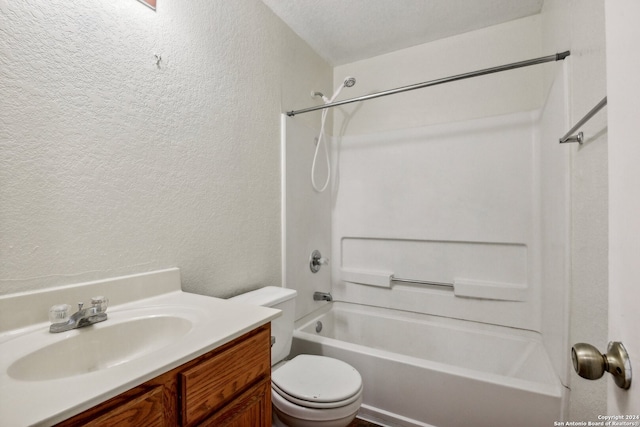 full bathroom with vanity, a textured ceiling, toilet, and shower / bath combination