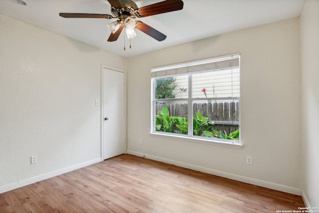 unfurnished room with light hardwood / wood-style floors and ceiling fan