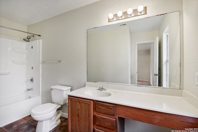 full bathroom featuring toilet, tile patterned flooring, shower / bath combination, vanity, and a textured ceiling