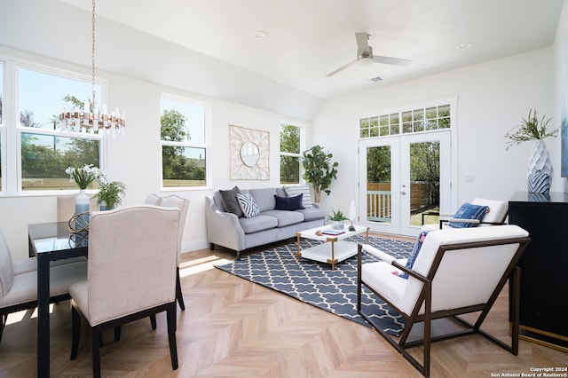 living room with light parquet flooring and plenty of natural light