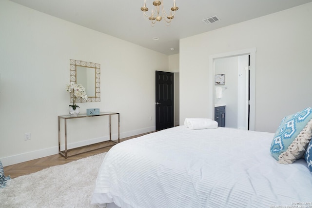 244 Porter St, San Antonio, TX 78210 - bedroom with an inviting chandelier, connected bathroom, baseboards, and visible vents