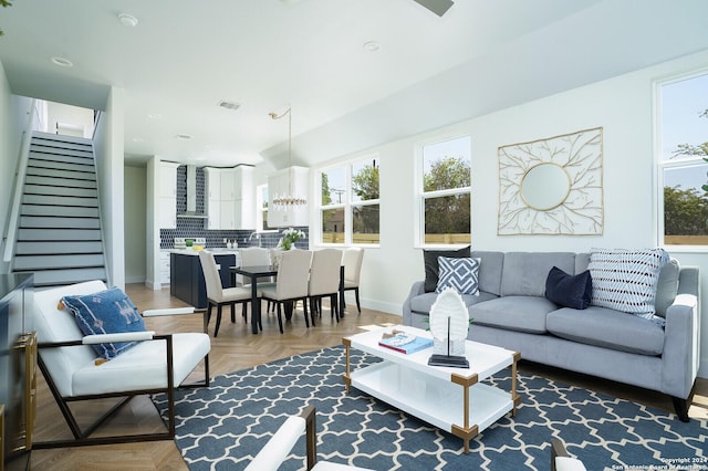 244 Porter St, San Antonio, TX 78210 - living room with a notable chandelier, recessed lighting, baseboards, visible vents, and stairs