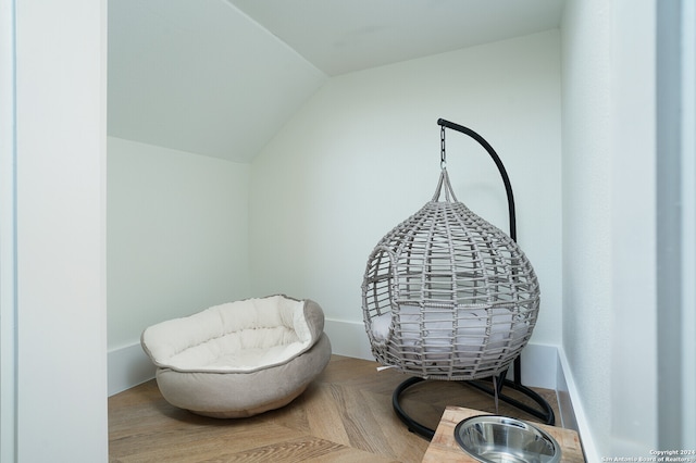 living area with vaulted ceiling