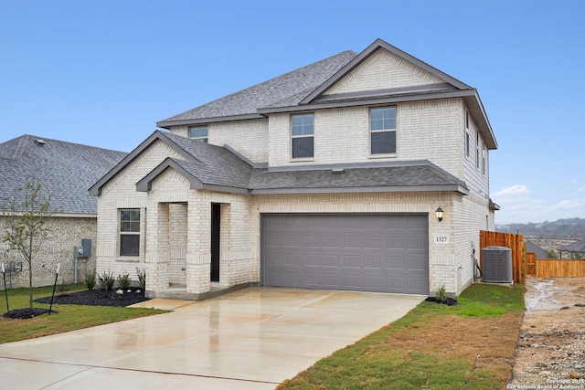 1327 Larkspur Pass, San Antonio, TX 78245 - view of front of house with a garage and a front lawn