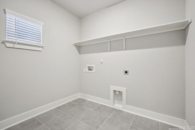 1327 Larkspur Pass, San Antonio, TX 78245 - laundry area with washer hookup, tile patterned floors, hookup for an electric dryer, and hookup for a gas dryer