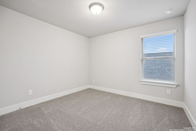 1327 Larkspur Pass, San Antonio, TX 78245 - carpeted empty room featuring a textured ceiling