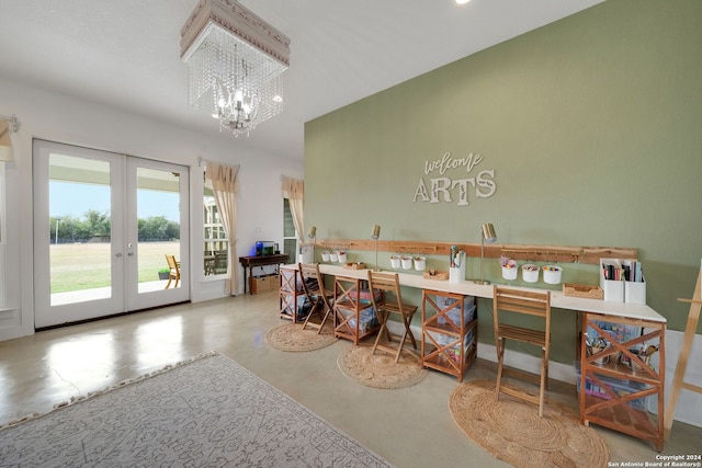 interior space featuring french doors and concrete flooring