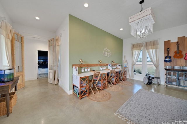 dining space featuring an inviting chandelier