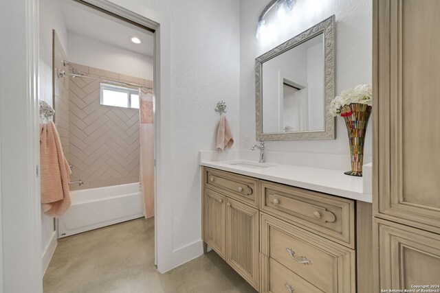 bathroom with vanity and shower / bath combination with curtain