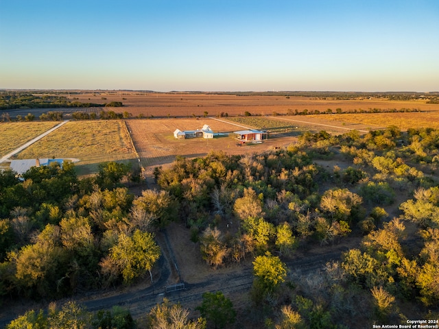 birds eye view of property featuring a rural view