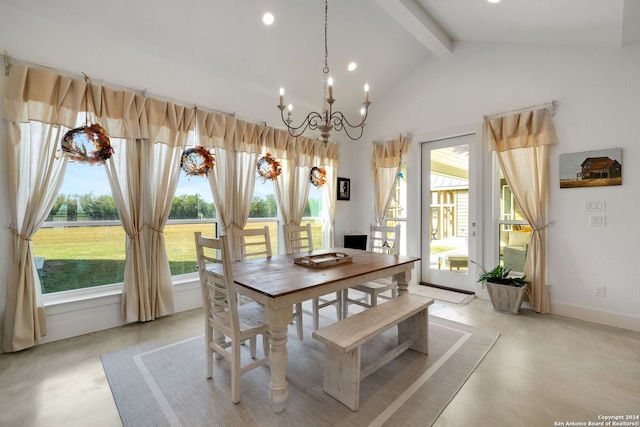 dining space featuring lofted ceiling with beams and an inviting chandelier