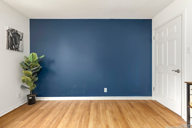 empty room with light wood-type flooring