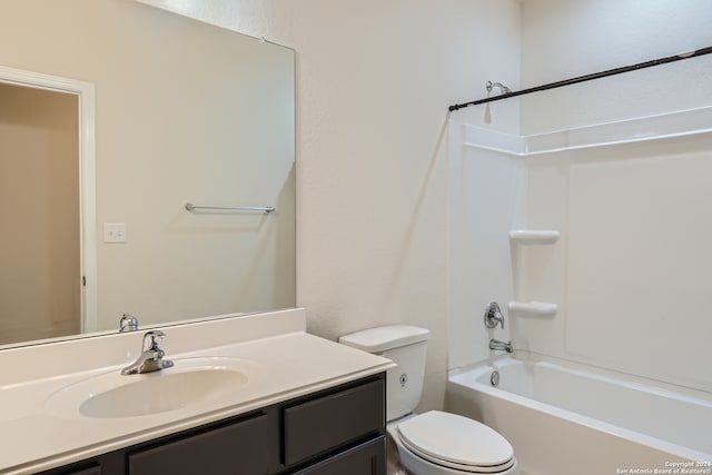 full bathroom with vanity, toilet, and shower / washtub combination