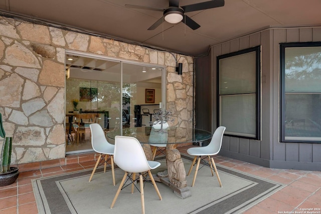 view of patio featuring ceiling fan