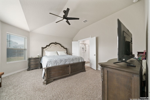 carpeted bedroom with ceiling fan and lofted ceiling