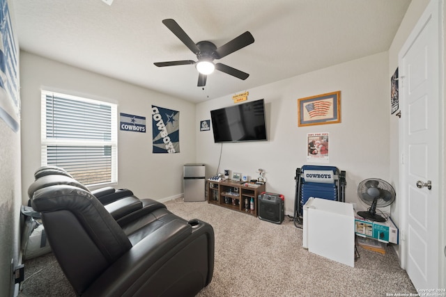 interior space with ceiling fan