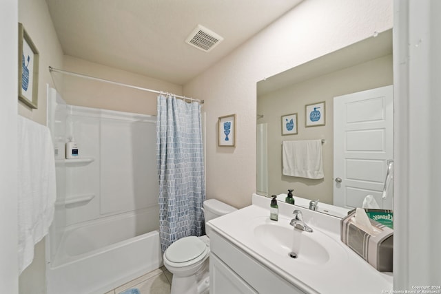 full bathroom with vanity, toilet, shower / tub combo, and tile patterned flooring