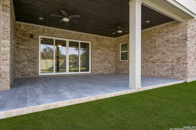 view of patio featuring ceiling fan