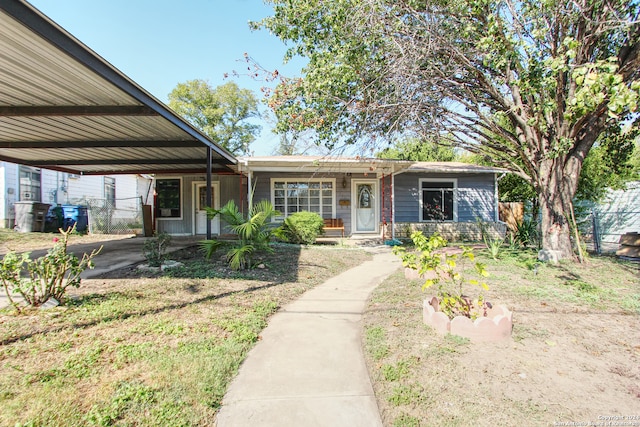 view of front facade featuring a carport