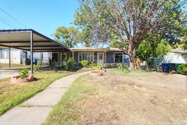 view of front of home featuring a carport