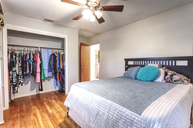 bedroom featuring a closet, ceiling fan, and wood-type flooring