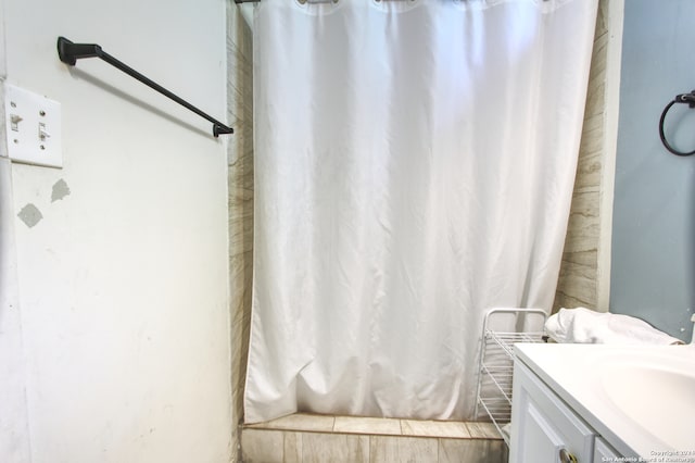 bathroom featuring vanity and walk in shower