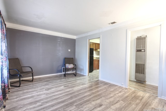 unfurnished room featuring light hardwood / wood-style flooring