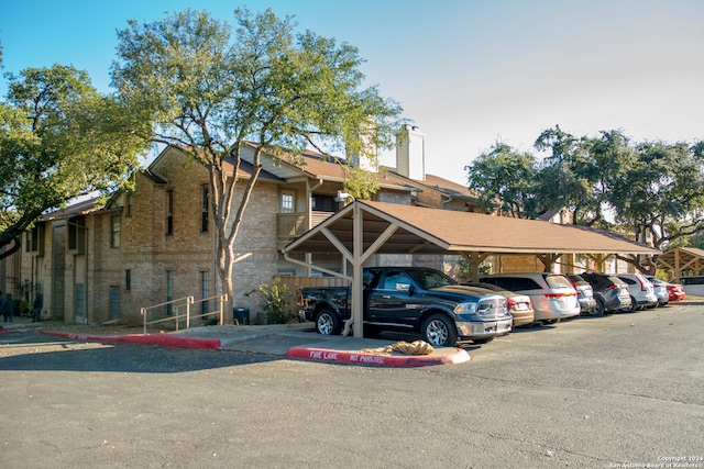 exterior space featuring a carport