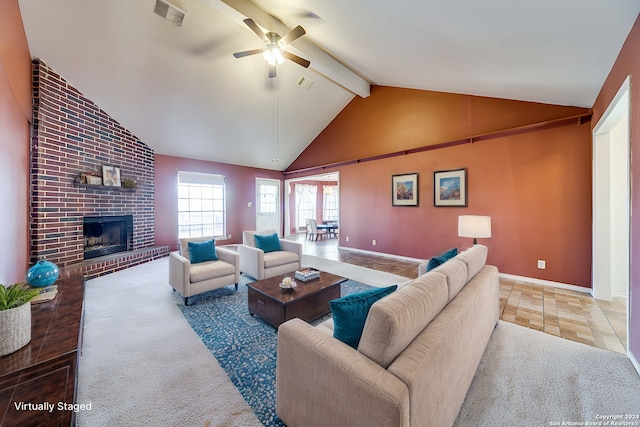 living room with a fireplace, high vaulted ceiling, tile patterned flooring, beamed ceiling, and ceiling fan