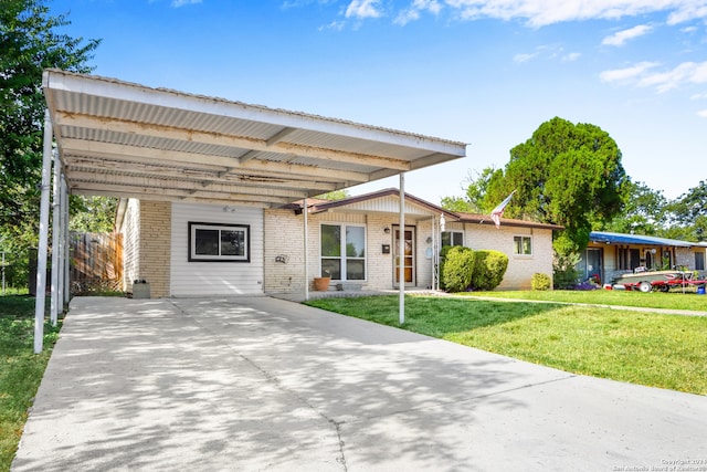 single story home featuring a front yard and a carport