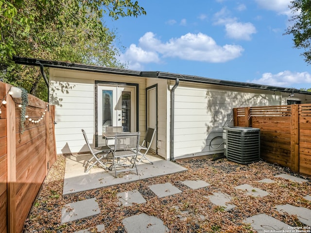 exterior space featuring central AC unit