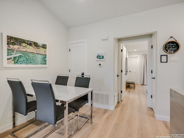 dining area with light wood-type flooring