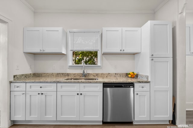 kitchen featuring stainless steel dishwasher and white cabinets