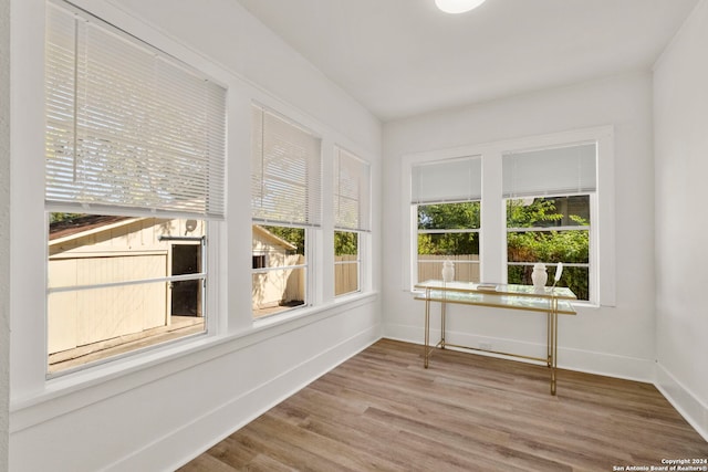 unfurnished sunroom featuring a healthy amount of sunlight