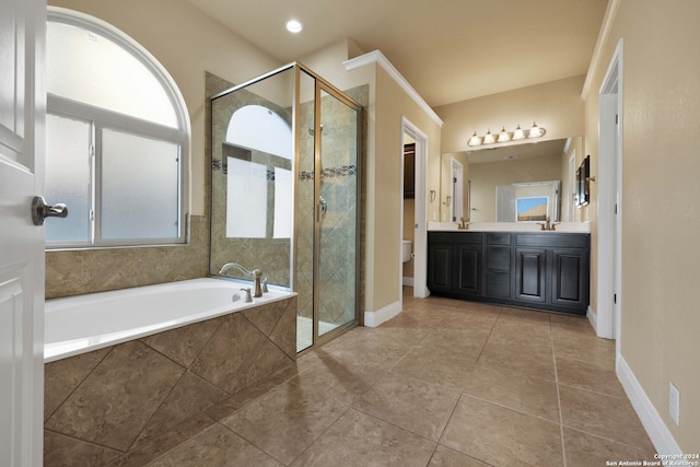 bathroom with vanity, separate shower and tub, and tile patterned floors