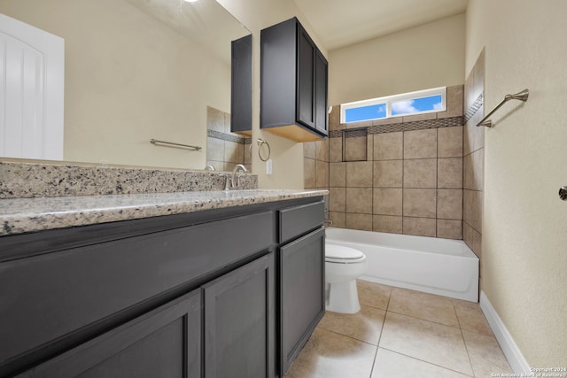 bathroom with vanity, toilet, and tile patterned flooring