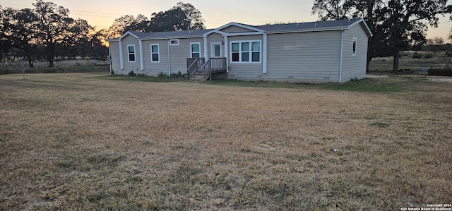 view of front facade with a lawn