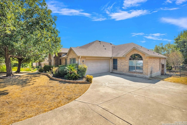 ranch-style home with a garage