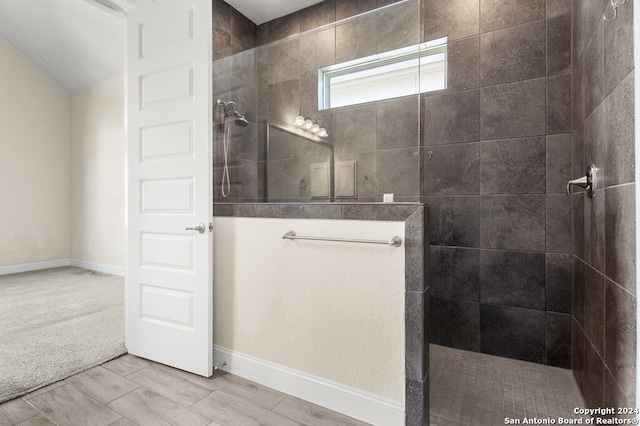 bathroom featuring tiled shower