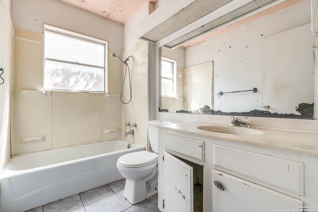 full bathroom featuring vanity, bathtub / shower combination, toilet, and tile patterned floors