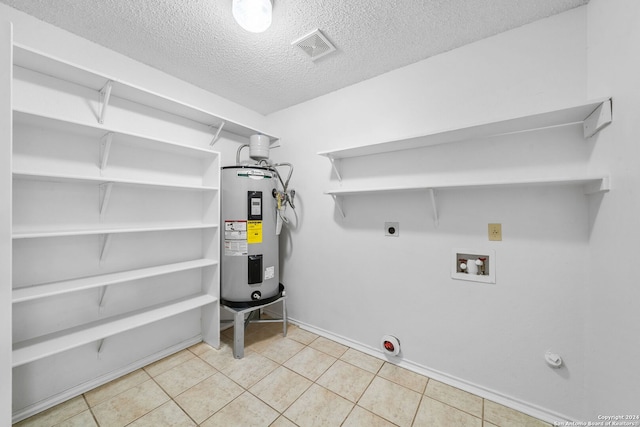 utility room with electric water heater